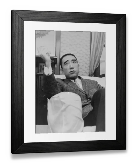 Framed Print : Yukio Mishimi Sitting on Couch Framed Print : Yukio Mishimi Sitting on Couch