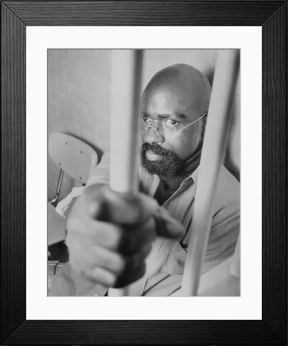 Framed Print : Former Boxer Rubin Carter Gripping Jail Bars Framed Print : Former Boxer Rubin Carter Gripping Jail Bars
