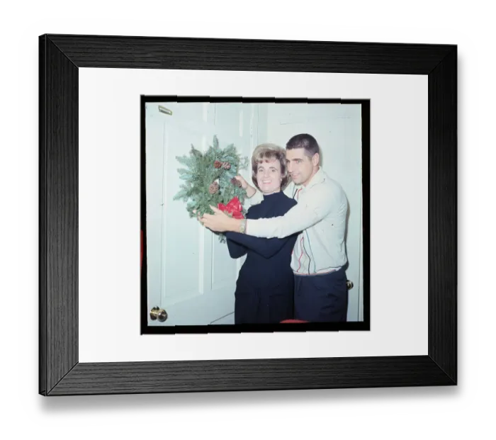 Framed Print : Earl and Jane Morrall Hanging a Decoration Framed Print : Earl and Jane Morrall Hanging a Decoration