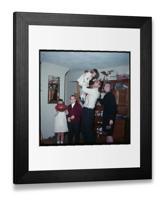 Framed Print : Earl Morrall Holding His Daughter Framed Print : Earl Morrall Holding His Daughter