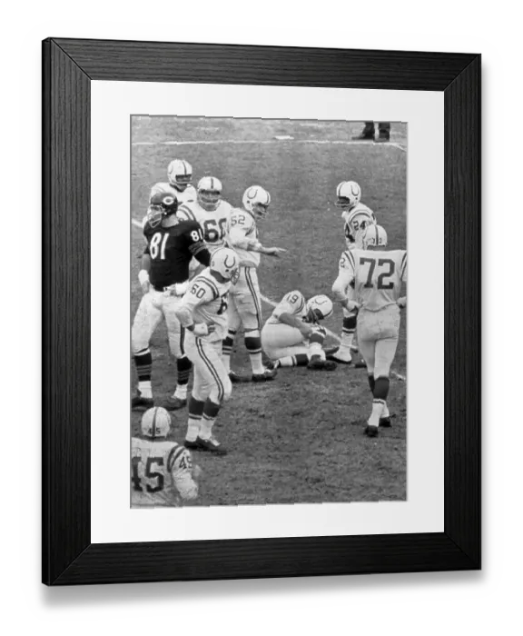 Framed Print : Johnny Unitas Holding Leg in Pain Framed Print : Johnny Unitas Holding Leg in Pain