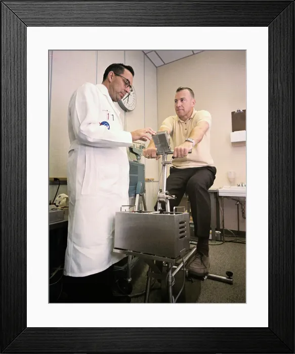 Framed Print : Doctor Examines James Lovell Framed Print : Doctor Examines James Lovell
