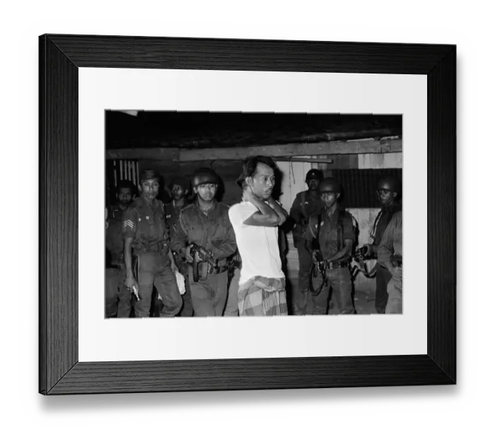 Framed Print : Man Under Gunpoint by Indonesian Army Framed Print : Man Under Gunpoint by Indonesian Army