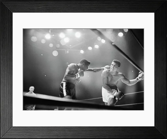 Framed Print : Cassius Clay Snarling at Floyd Patterson Framed Print : Cassius Clay Snarling at Floyd Patterson