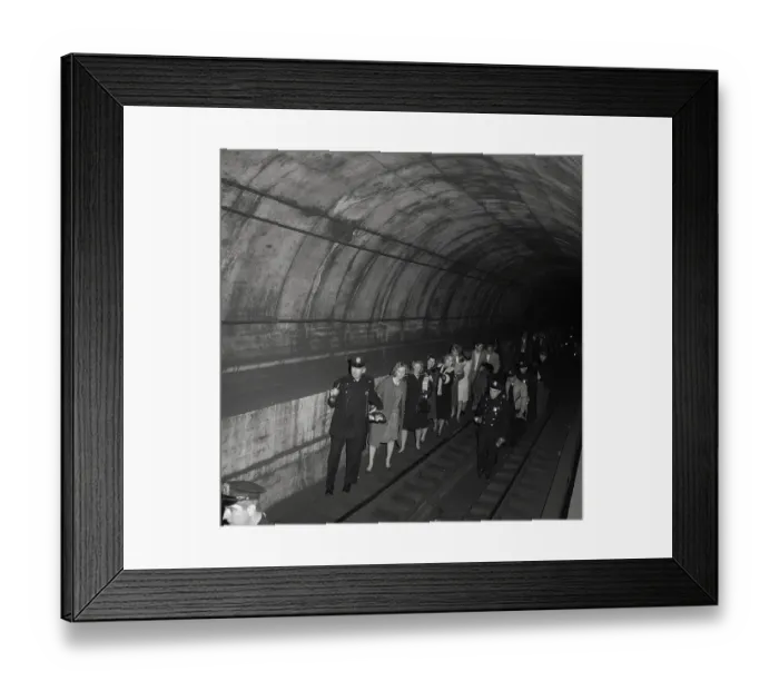 Framed Print : Policemen Leading Subway Passengers to Safety Framed Print : Policemen Leading Subway Passengers to Safety
