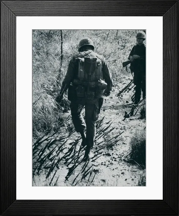 Framed Print : Soldier Stepping Through Punji Trap