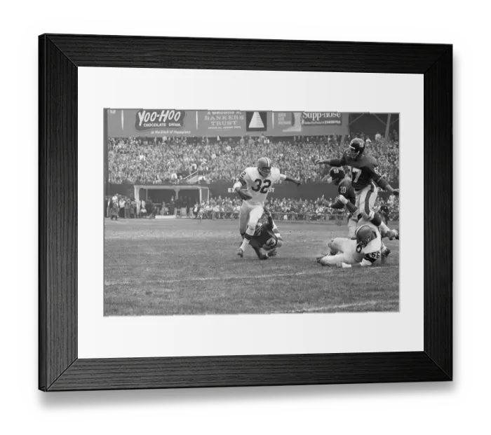Framed Print : Jim Brown Being Tackled by Opponent Framed Print : Jim Brown Being Tackled by Opponent