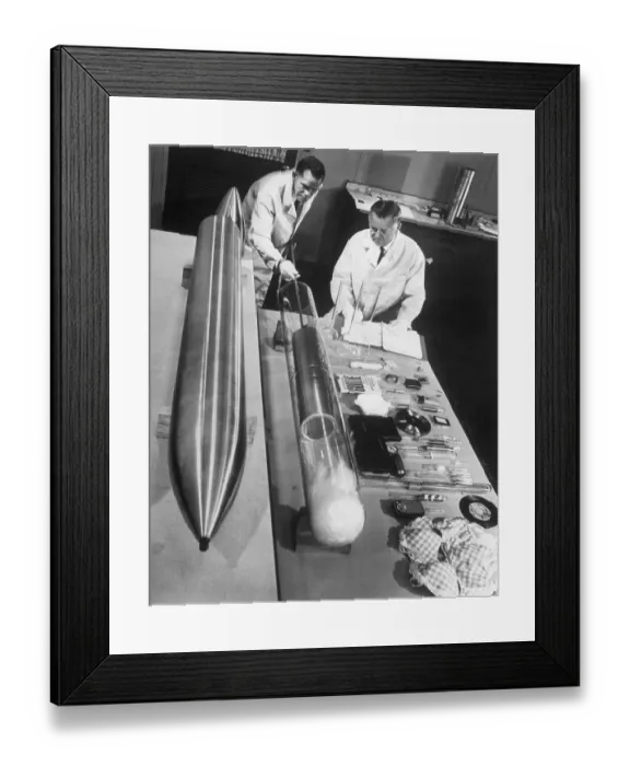 Framed Print : Scientists Loading a Time Capsule Framed Print : Scientists Loading a Time Capsule