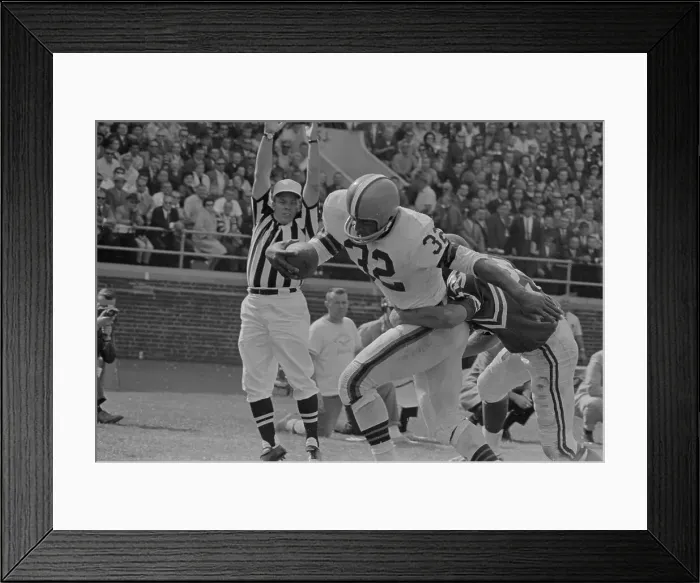 Framed Print : Jim Brown Being Tackled by Opponents Framed Print : Jim Brown Being Tackled by Opponents