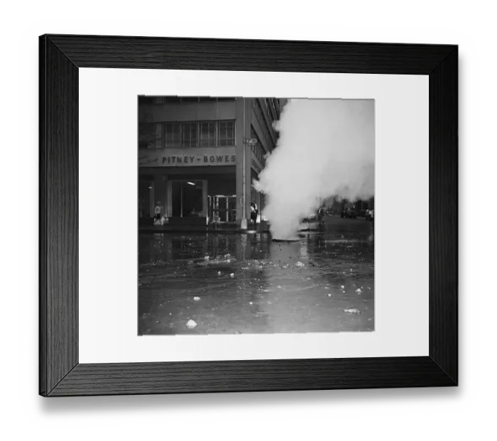 Framed Print : Steam Pours From Sewer On Flooded Street Framed Print : Steam Pours From Sewer On Flooded Street