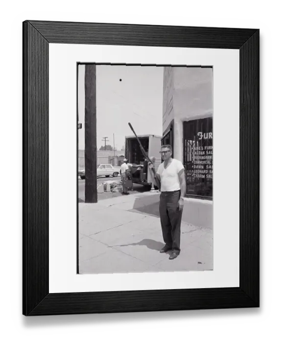 Framed Print : Store Owner with Rifle