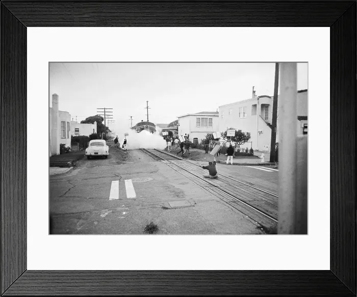 Framed Print : Vietnam War Protester Sitting on Train Tracks Framed Print : Vietnam War Protester Sitting on Train Tracks