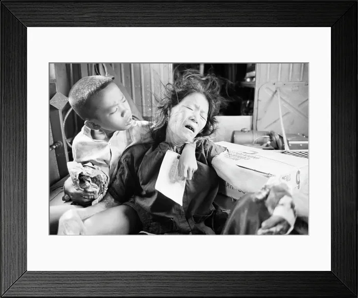 Framed Print : Vietnamese Boy Comforting Wounded Mother Framed Print : Vietnamese Boy Comforting Wounded Mother
