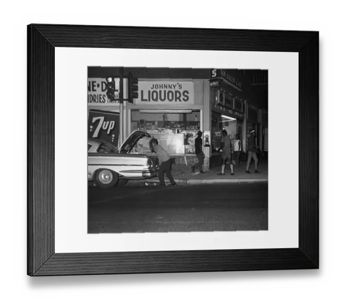 Framed Print : Looter Loading Car Framed Print : Looter Loading Car