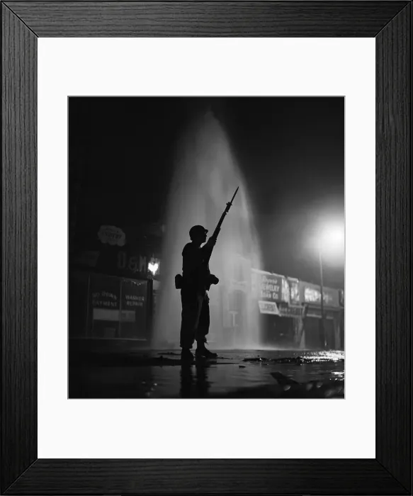Framed Print : Soldier Silhouetted By Hydrant Spray Framed Print : Soldier Silhouetted By Hydrant Spray