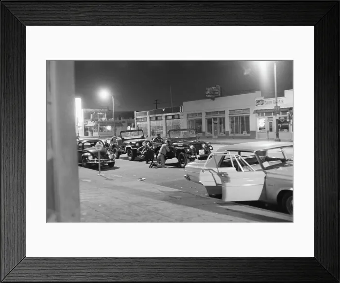 Framed Print : National Guard Hiding Behind Jeeps