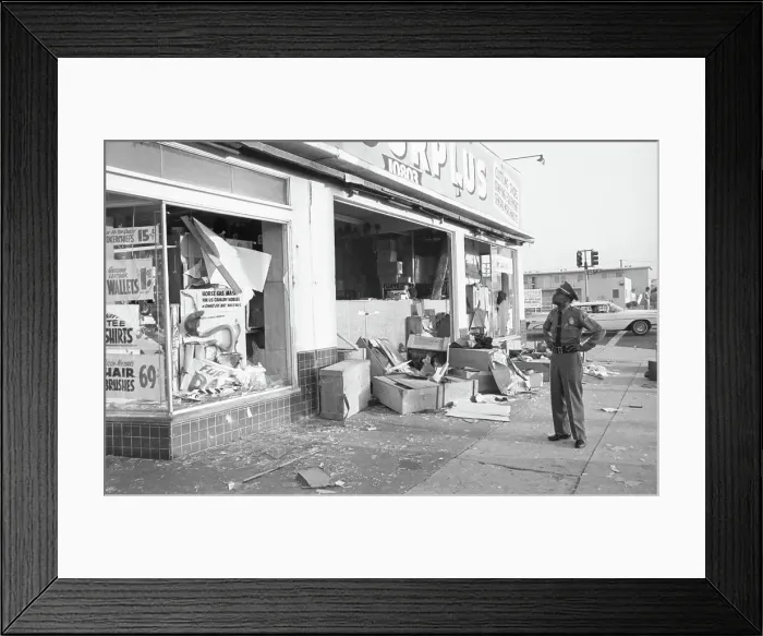 Framed Print : Police Officer Looks Over Damage from Looters Framed Print : Police Officer Looks Over Damage from Looters