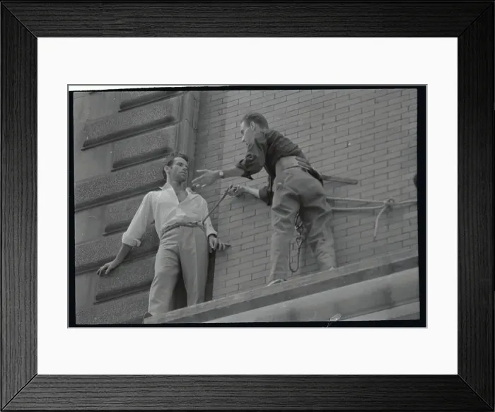 Framed Print : Policeman Rescuing Man on Ledge Framed Print : Policeman Rescuing Man on Ledge