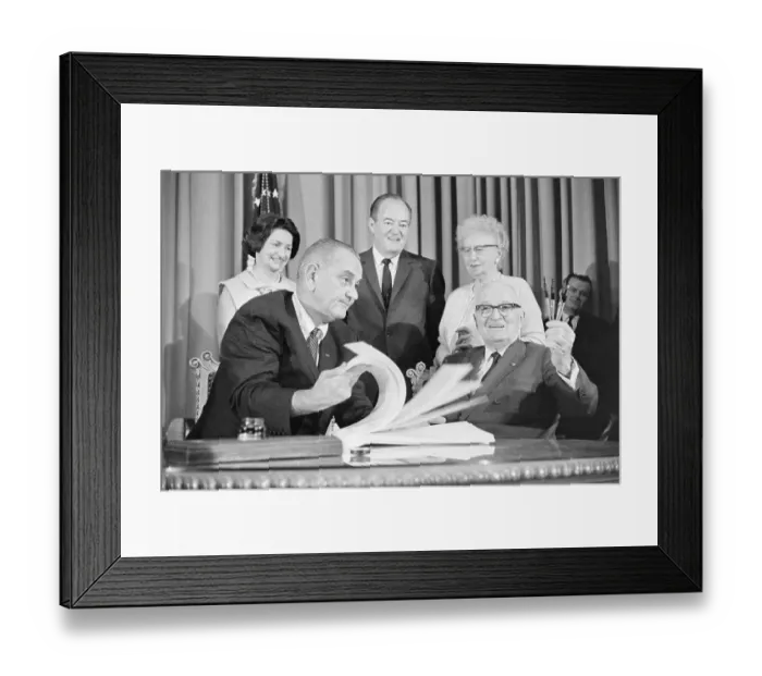 Framed Print : Lyndon Johnson Looking Over Medicare Bill Framed Print : Lyndon Johnson Looking Over Medicare Bill