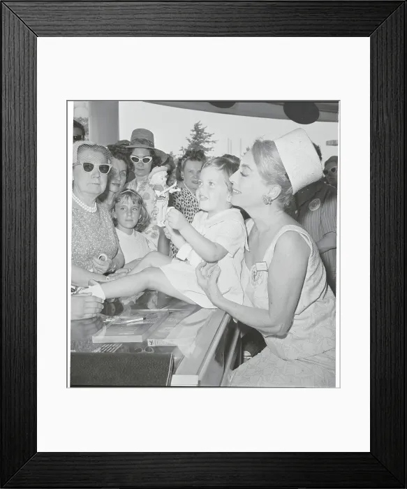 Framed Print : Actress Joan Crawford with Child at UNICEF Function Framed Print : Actress Joan Crawford with Child at UNICEF Function