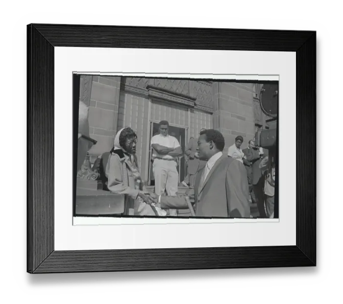 Framed Print : Jim Brown Shaking Hands with an unidentified Woman Framed Print : Jim Brown Shaking Hands with an unidentified Woman