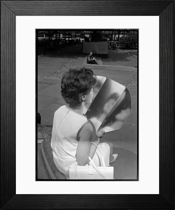Framed Print : Woman Tanning with Reflective Panel Framed Print : Woman Tanning with Reflective Panel