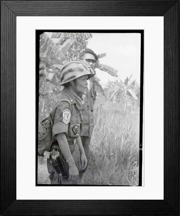 Framed Print : The Tiger Lady Walking with Soldier Framed Print : The Tiger Lady Walking with Soldier