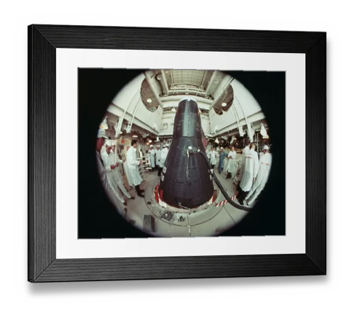 Framed Print : NASA Technicians Working by a Space Capsule Framed Print : NASA Technicians Working by a Space Capsule
