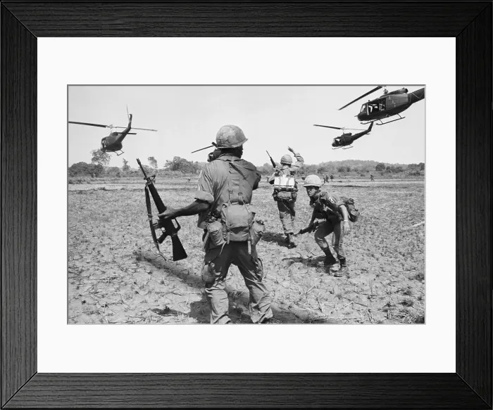 Framed Print : American Paratroopers in field Below Helicopters in South Vietnam Framed Print : American Paratroopers in field Below Helicopters in South Vietnam