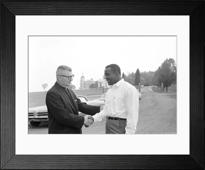 Framed Print : Sonny Liston Shaking Hands with Priest Framed Print : Sonny Liston Shaking Hands with Priest