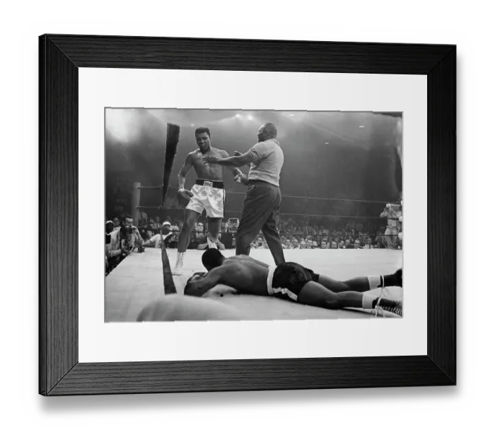 Framed Print : Cassius Clay Towering Over Sonny Liston During Boxing Match