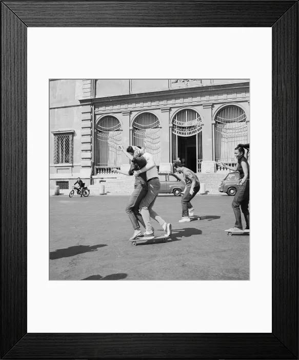 Framed Print : Couple Riding On Skateboard
