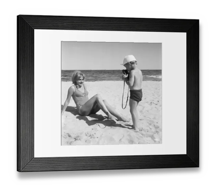 Framed Print : Boy Photographing Reclining Woman Framed Print : Boy Photographing Reclining Woman