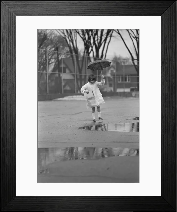 Framed Print : Girl W / Umbrella Contemplating Puddle Framed Print : Girl W / Umbrella Contemplating Puddle