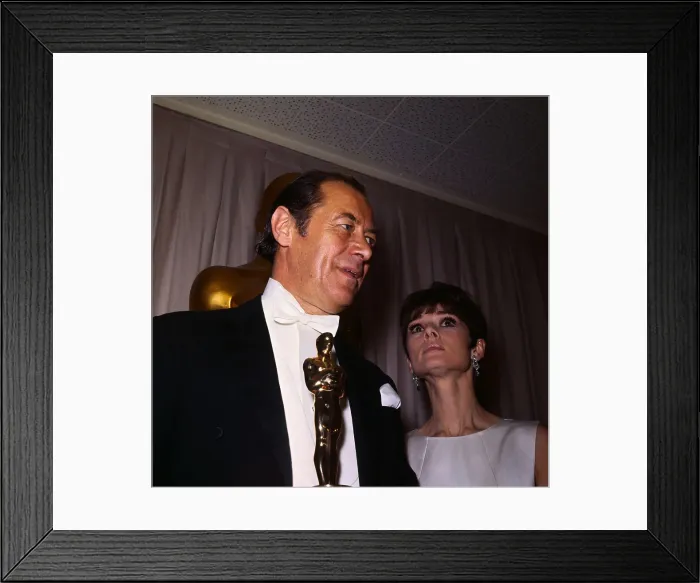 Framed Print : Rex Harrison Holding Oscar with Audrey Hepburn