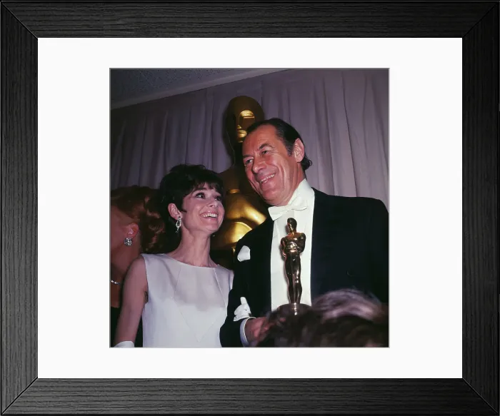 Framed Print : Audrey Hepburn with Rex Harrison Holding Academy Award Framed Print : Audrey Hepburn with Rex Harrison Holding Academy Award