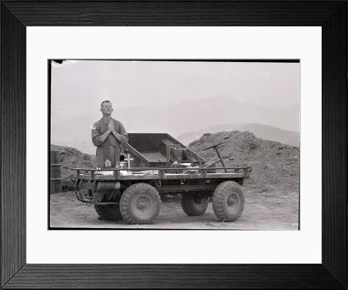 Framed Print : Rev.Kneels In Prayer On Military Vehicle Framed Print : Rev.Kneels In Prayer On Military Vehicle