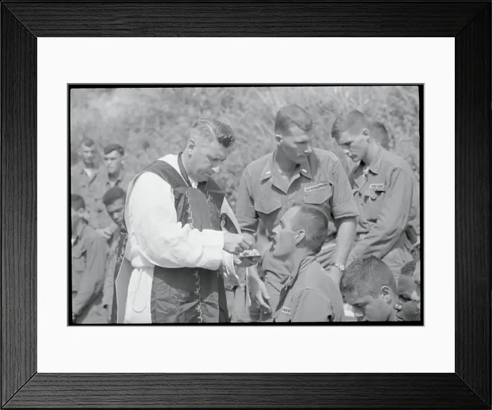 Framed Print : John O'Connor Offering Communion to Soldier Framed Print : John O'Connor Offering Communion to Soldier