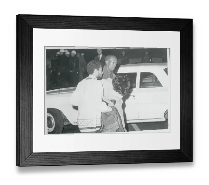Framed Print : Men Carrying Woman Framed Print : Men Carrying Woman