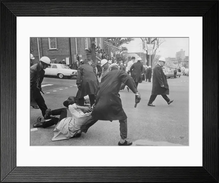 Framed Print : Policeman Dragging Demonstrator on the Street Framed Print : Policeman Dragging Demonstrator on the Street