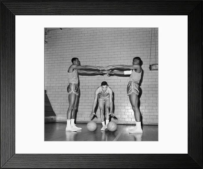 Framed Print : Three College Basketball Players Exercising Framed Print : Three College Basketball Players Exercising