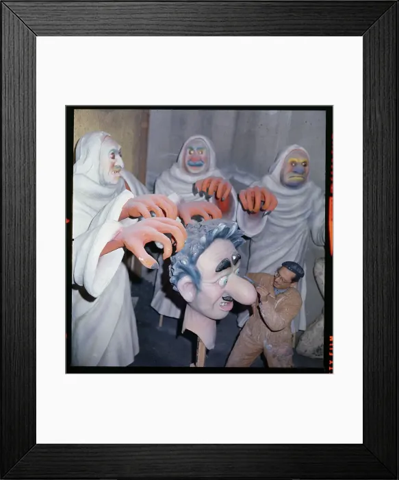 Framed Print : Artist Preparing Puppet For Annual Carnival Framed Print : Artist Preparing Puppet For Annual Carnival