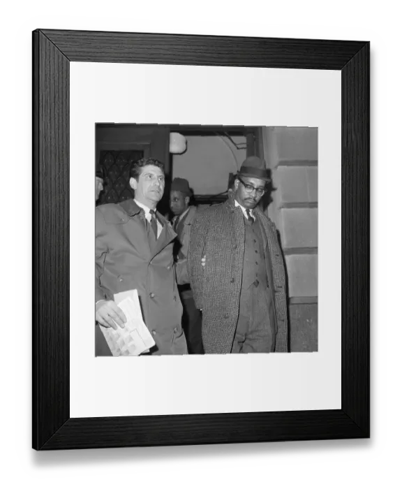 Framed Print : Reuben Francis Being escorted From Jail