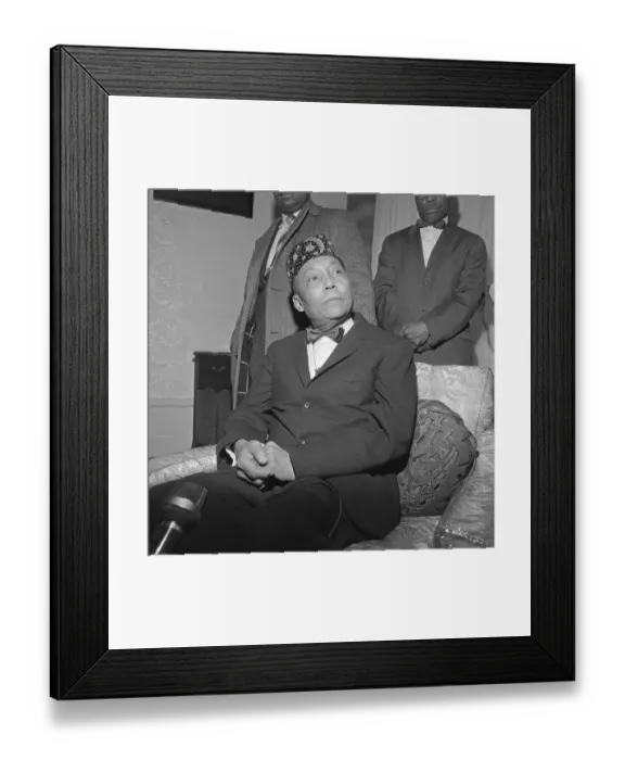 Framed Print : Elijah Muhammad Sitting with Hands Clasped Framed Print : Elijah Muhammad Sitting with Hands Clasped