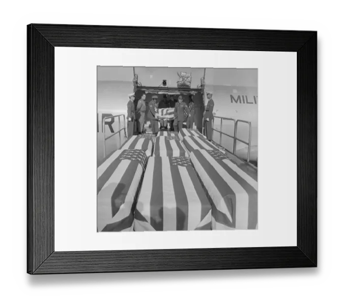 Framed Print : American Flag Covered Caskets Being Unloaded from Airplane Framed Print : American Flag Covered Caskets Being Unloaded from Airplane