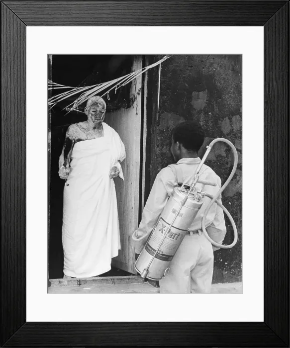 Framed Print : Man Talking With a Shaman About Malaria Prevention Framed Print : Man Talking With a Shaman About Malaria Prevention