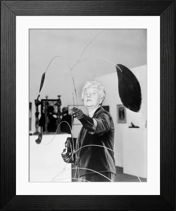 Framed Print : Peggy Guggenheim Adjusts A Mobile Framed Print : Peggy Guggenheim Adjusts A Mobile