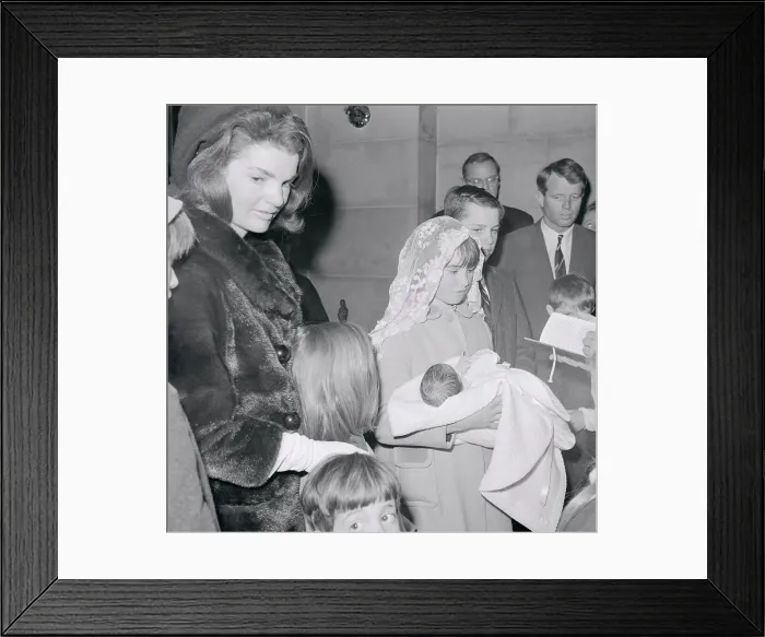 Framed Print : Kennedy Child Receiving Baptism Framed Print : Kennedy Child Receiving Baptism