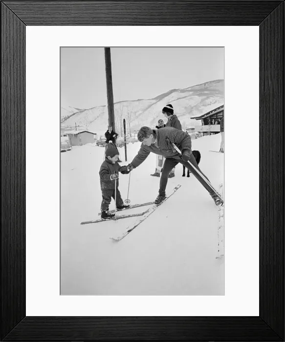 Framed Print : Robert Kennedy Helping John Kennedy Jr. With His Skis Framed Print : Robert Kennedy Helping John Kennedy Jr. With His Skis