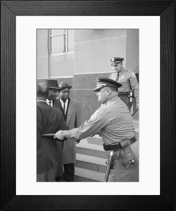 Framed Print : Policeman Prodding African-American Framed Print : Policeman Prodding African-American